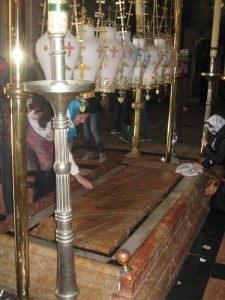 The Stone of Unction: the spot where Jesus' body was laid when first taken down from the Cross.  Church of the Holy Sepulcher, Jerusalem.