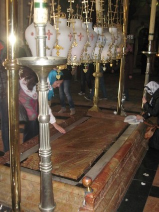 The Stone of Unction: the spot where Jesus' body was laid when first taken down from the Cross.  Church of the Holy Sepulcher, Jerusalem.